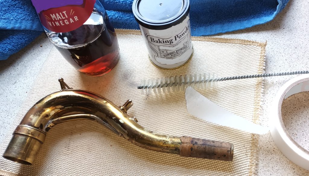 Required cleaning items Items needed to clean a saxophone neck