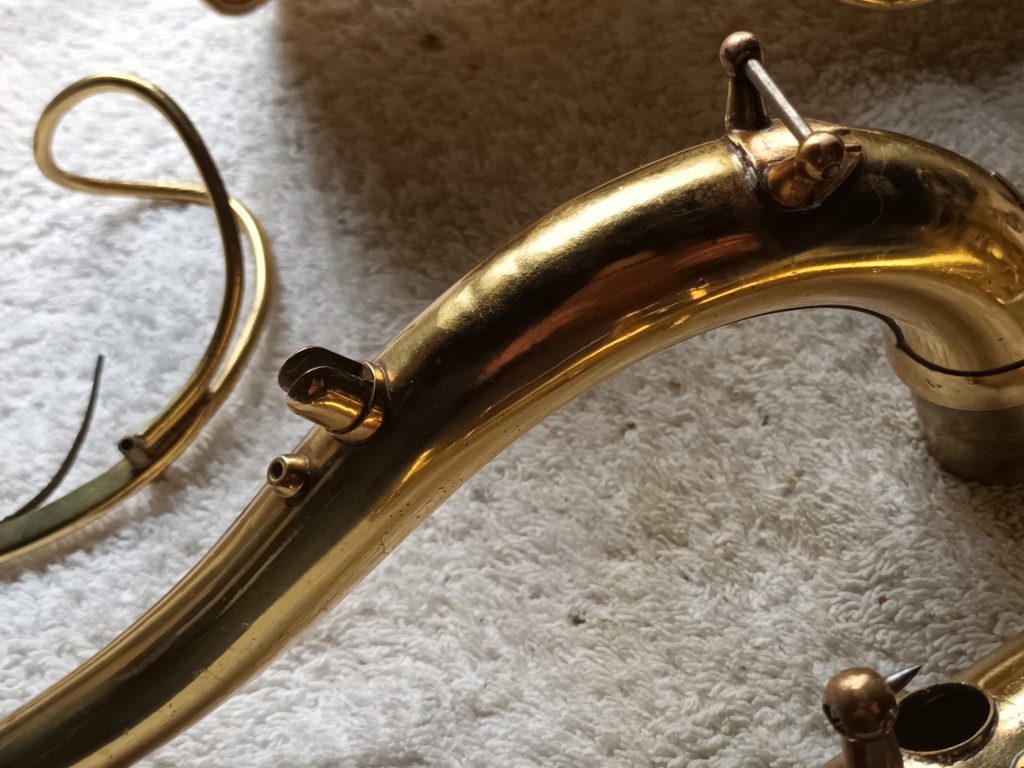 Dents removed from saxophone neck Dented saxophone neck repair
