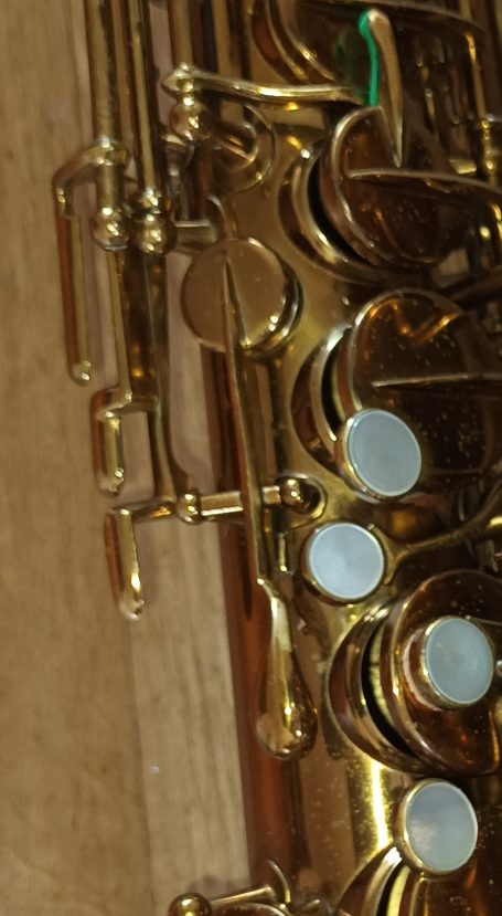 Side F# key from a vintage saxophone